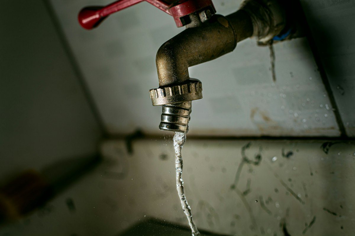 Water running from a valve attached to a pipe